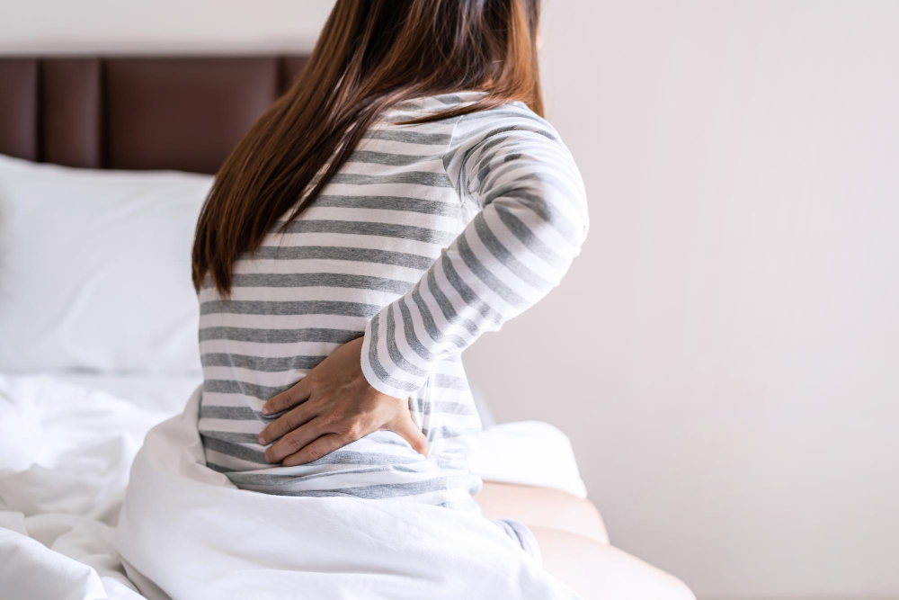Skausmas nugaros apačioje – galimos priežastys ir pagalba
